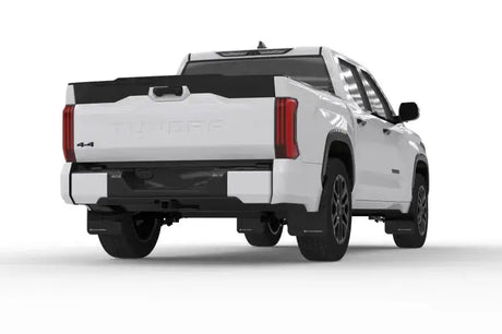 White Toyota Tundra pickup with black UR mud flaps and Rally Armor logo