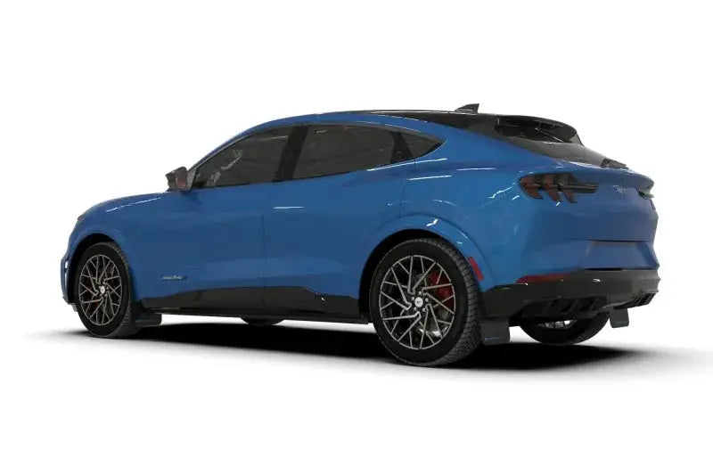 Blue electric crossover SUV with rally armor mud flaps and red logo on Ford Mustang Mach-E