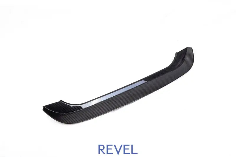 Carbon fiber car spoiler with dry carbon finish on Revel GT Dry Carbon Toyota GR8 Subaru BRZ carbon step guard