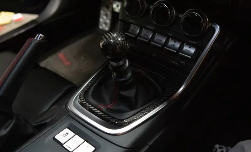 Car’s manual gear stick with revel gt dry carbon shifter panel cover for Toyota GR86