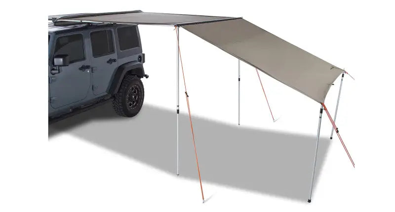 Vehicle-mounted batwing sunseeker awning with support poles for shade and protection