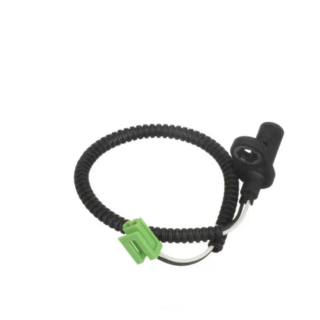Black ABS sensor with green connector.