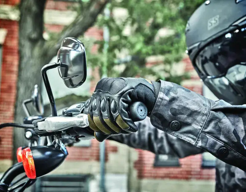 Motorcycle rider wearing Speed and Strength Call to Arms Gloves Brown small arm gloves