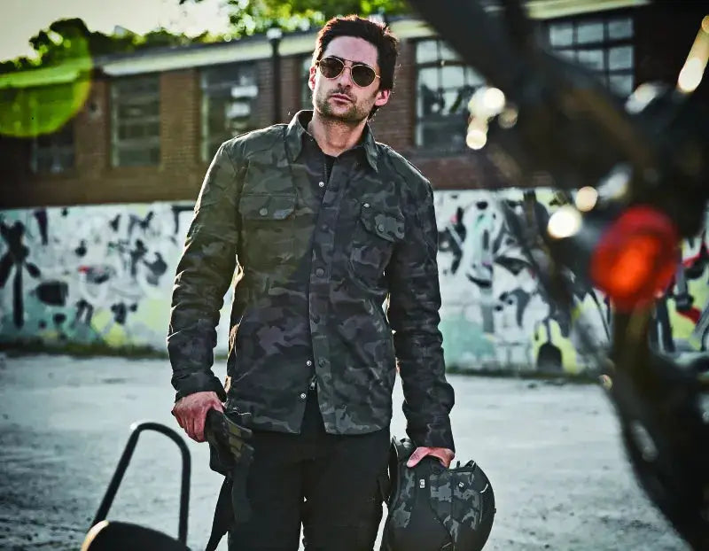 Man in camouflage arms moto shirt showcasing Speed and Strength Call to Arms Moto Shirt Small