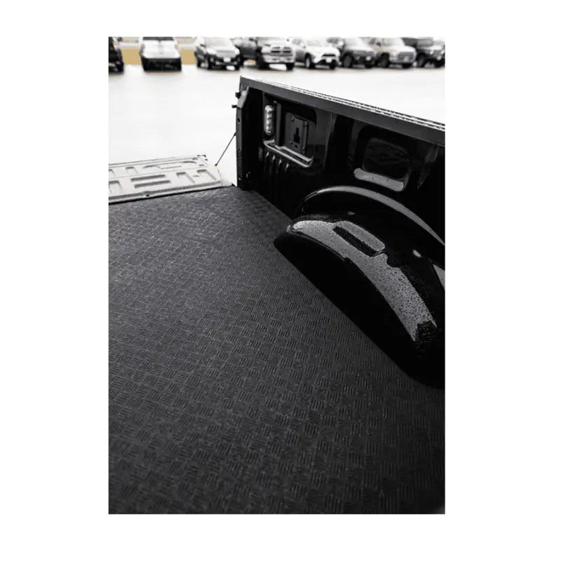Textured black truck bed liner.