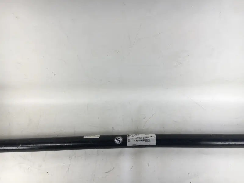 Black metal bar with label from V000499739 Lippert RV parts & accessories