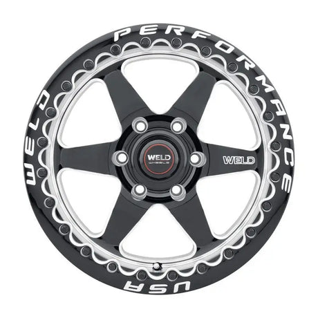Black and silver Weld Racing wheel.