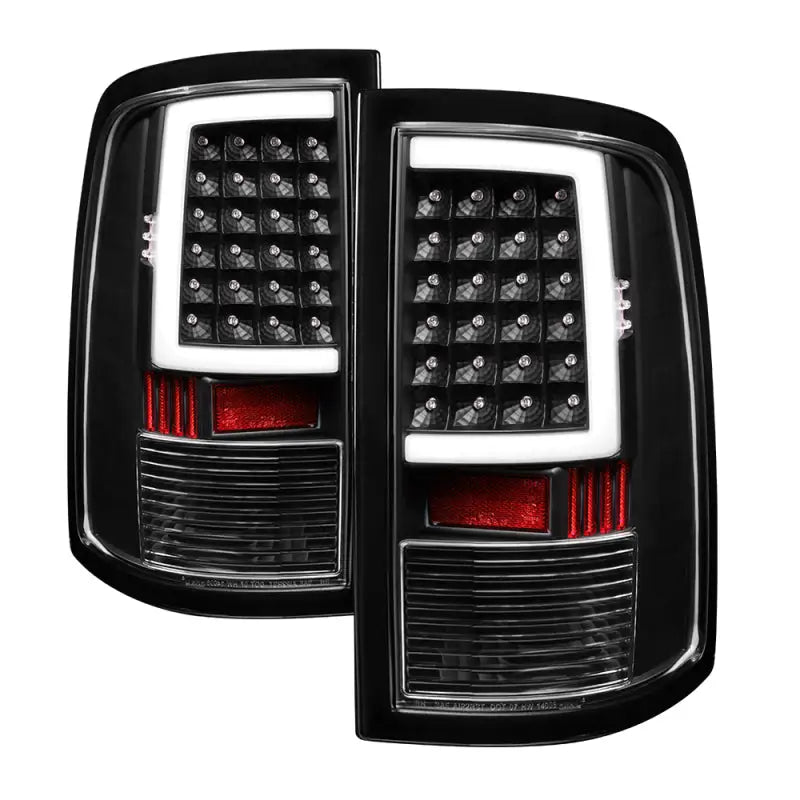 Stylish black LED tail lights for 09-18 Dodge Ram 1500 by xTune