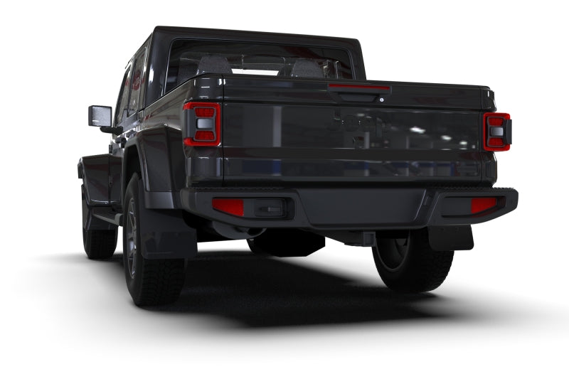 Black Jeep JT Gladiator Mojave/Rubicon rear view with Rally Armor black mud flaps and grey logo, showcasing durable off-road and exterior truck accessories, Truck & Automotive, AVADA - Best Sellers