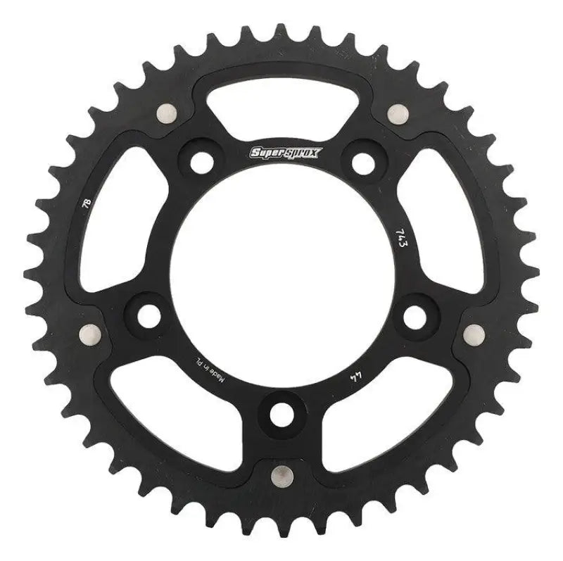 Black Supersprox sprocket gear with silver bolts and teeth for powersports sprockets