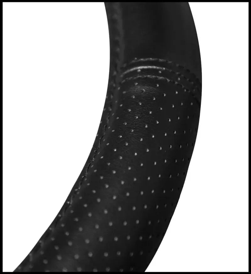 Close-up of 006697R25 Plasticolor Ram Deluxe Steering Wheel Cover showcasing high-quality material and textured grip.