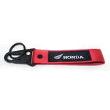 Red lens Honda keychain with black hardware for auto acc command accessories