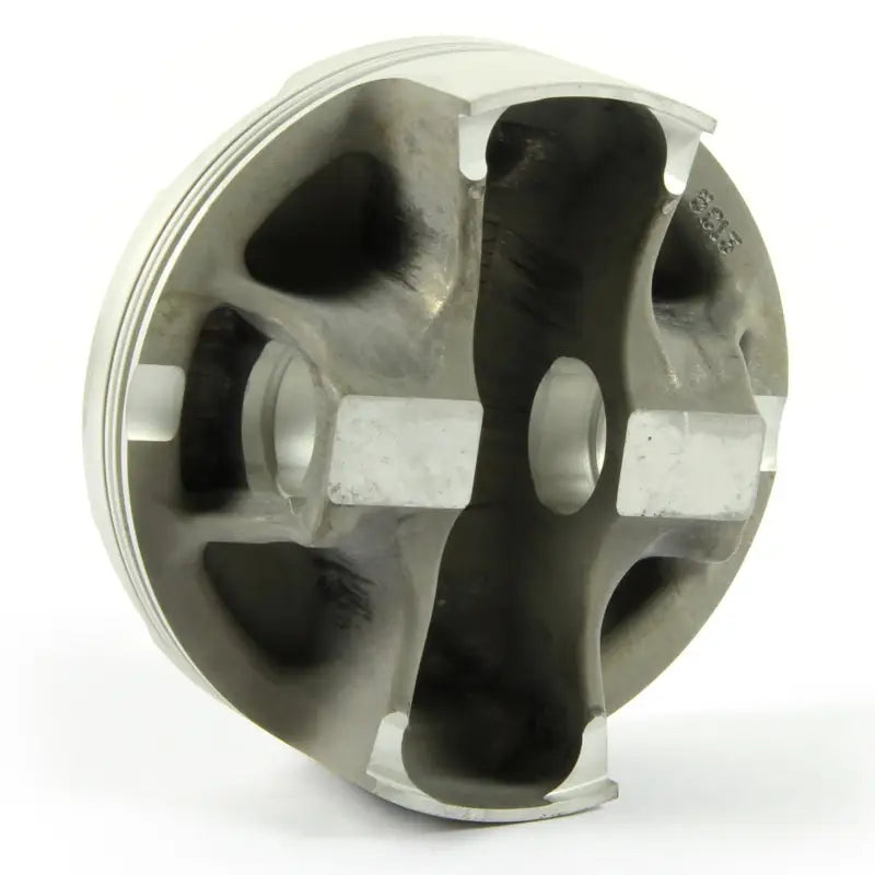 Underside of silver forged piston kit with structural supports for RV and truck parts