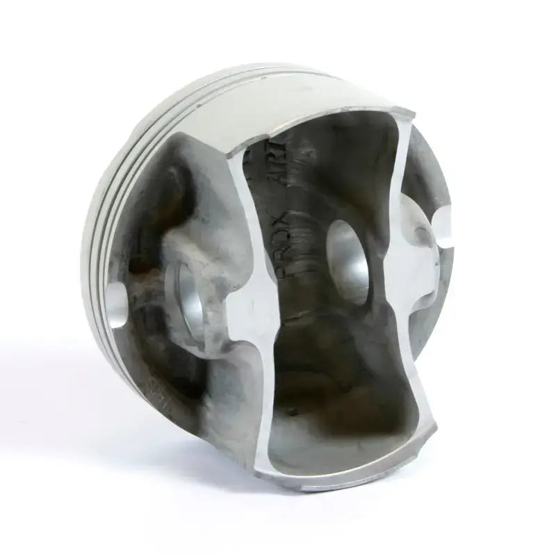 Cutaway engine piston showing forged nikasil piston kit for Kaw/Suz engines