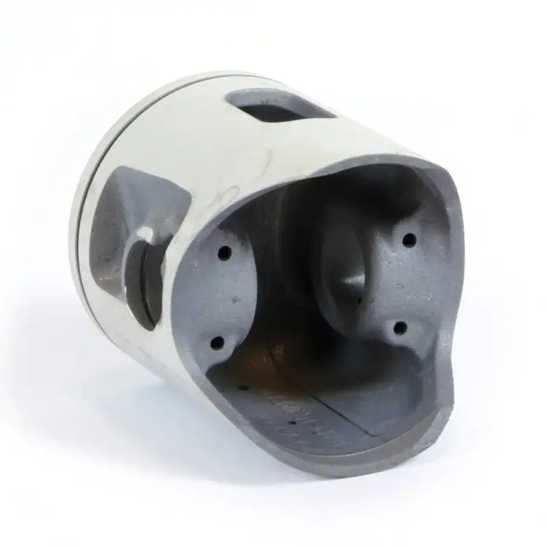 Light gray engine piston kit with dark gray interior, holes, and openings for RV & truck parts
