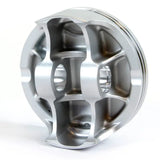 Shiny silver piston kit with intricate internal parts, perfect for RV and truck parts