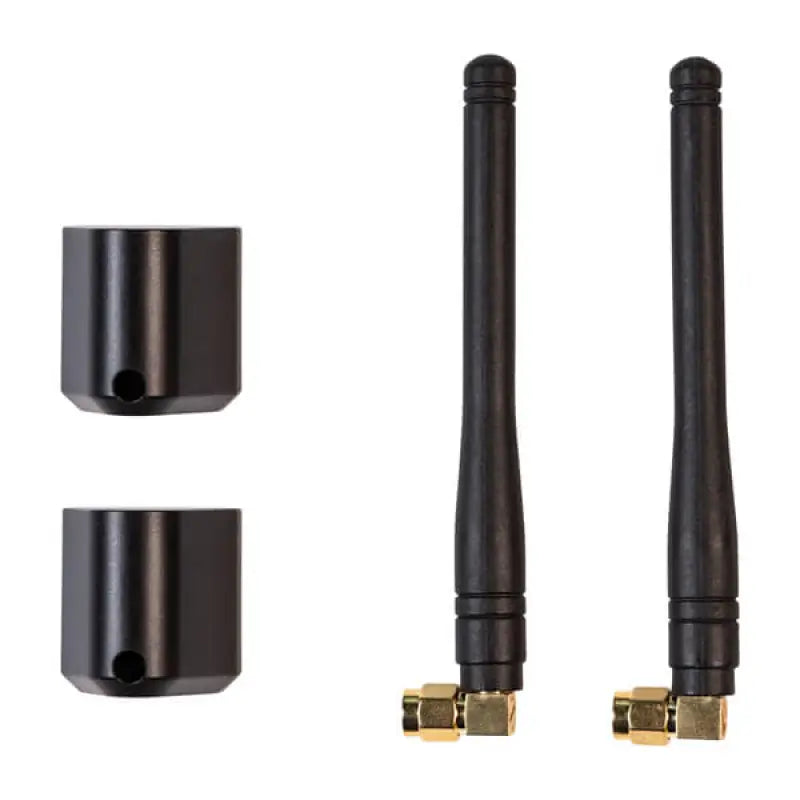Two black Garmin Ondeck LTE antennas with gold connectors and mounts for replacement