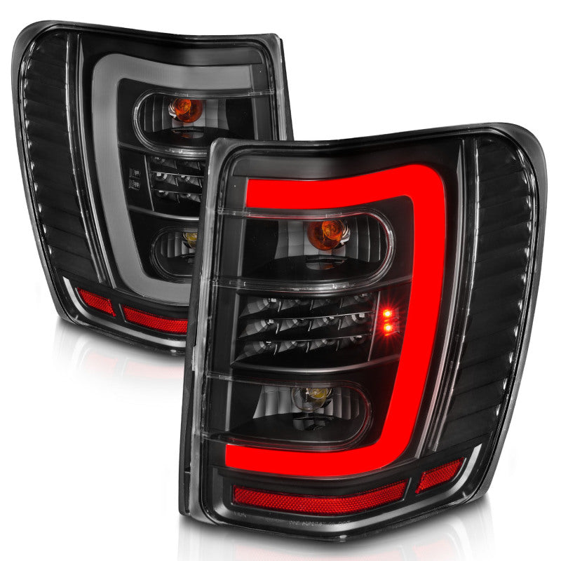 ANZO 311394 ANZO 1999-2004 Jeep Grand Cherokee LED Tail Lights w/ Light Bar Black Housing Clear Lens