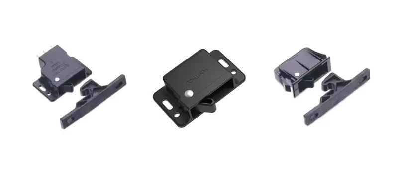 Black plastic spring loaded cab catch for secure storage in the 0238015 Key Auto Acc series