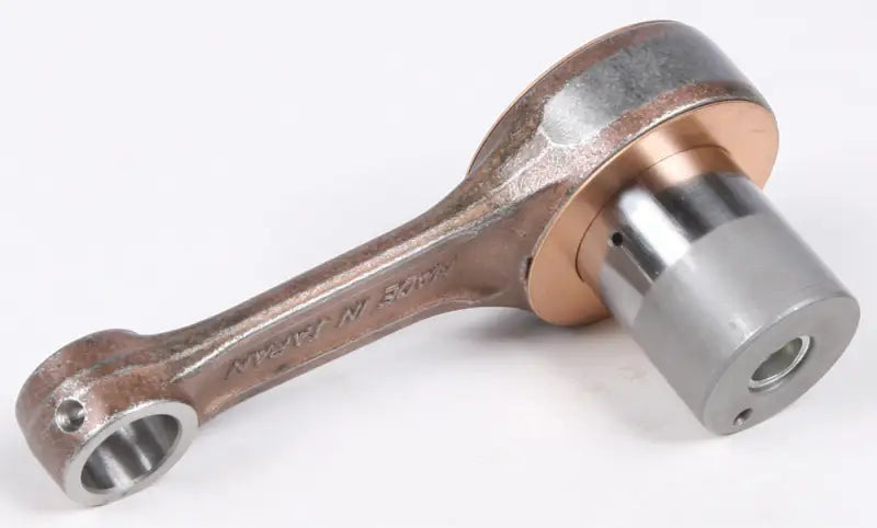 Rusty metallic connecting rod with bronze collar from 03.4340 Connecting Rod Kit Kaw