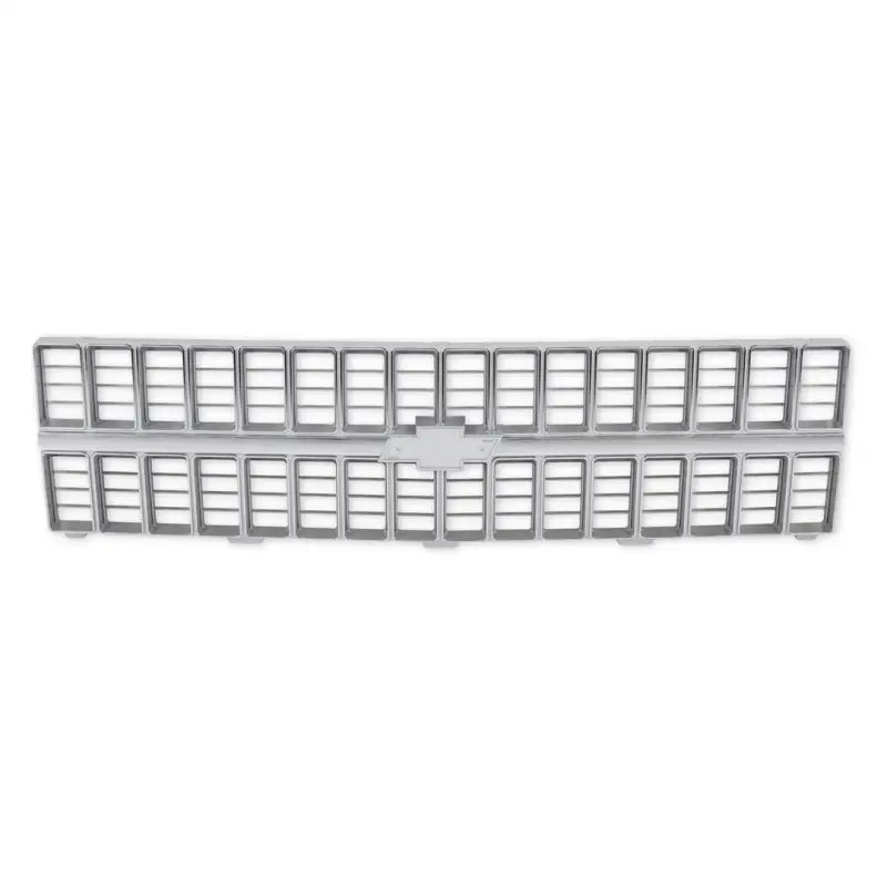 Silver Chevrolet grille from the 04-174 Holley 1981-82 C/K Grille with Bowtie Mount