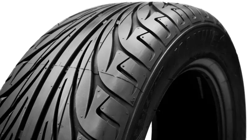 Dark new 042015002A1 Kenda Kanine motorcycle tire with directional tread pattern