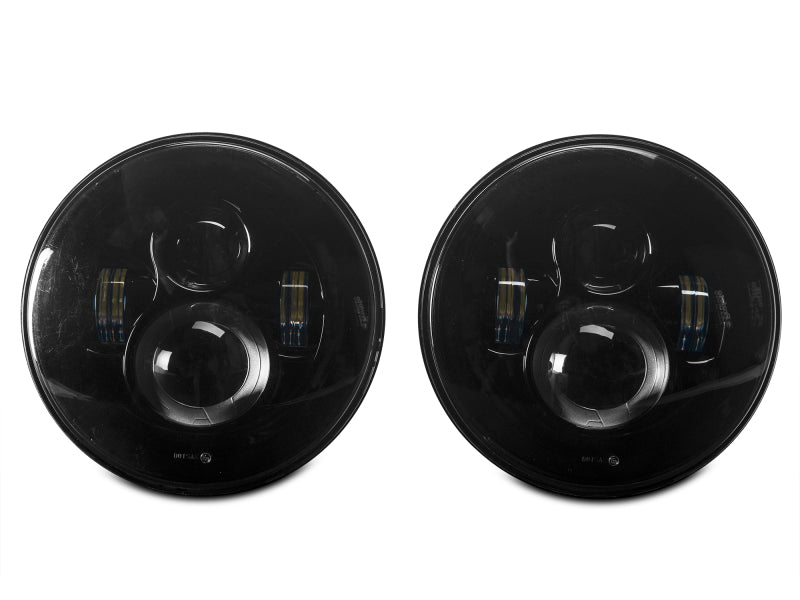 Raxiom J108042 Raxiom 97-18 Jeep Wrangler TJ/JK Axial Series LED Daymaker Headlights- Black Housing (Clear Lens)