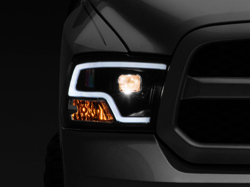 Raxiom R111516 Raxiom 09-18 RAM 1500 LED Halo Projector Headlights- Black Housing (Clear Lens)