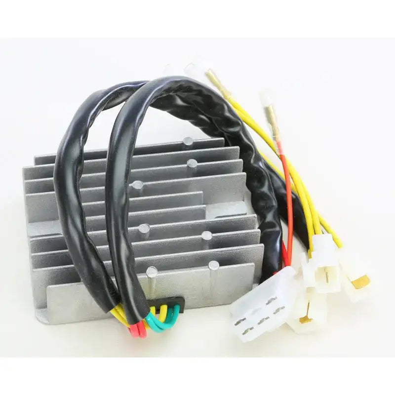 Silver automotive rectifier regulator with cooling fins and multi-colored wires for RV and truck parts