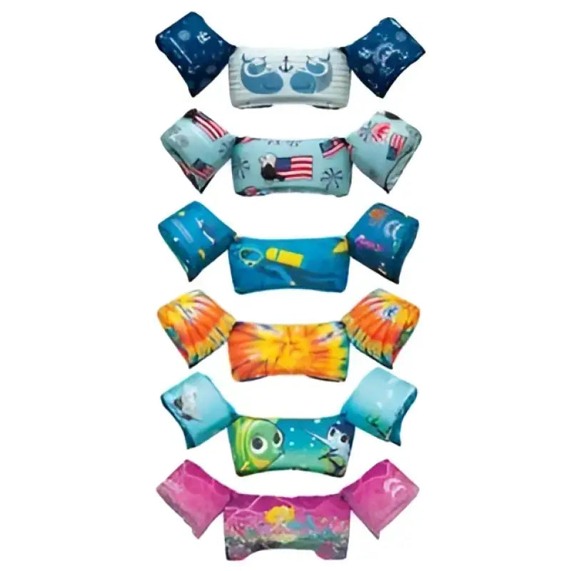 Assorted maritime-themed life vests from Airhead Otter Elite Ch Life V collection, showcasing vibrant designs and high-quality construction for ultimate safety and comfort in water activities.