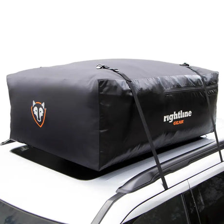 Black car top carrier on 100S30 Rightline Sport roof rack for outdoor trips
