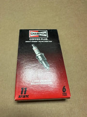 Box of 11 Champion Copper Plus Spark Plugs, 6 per box, ensuring reliable engine performance.