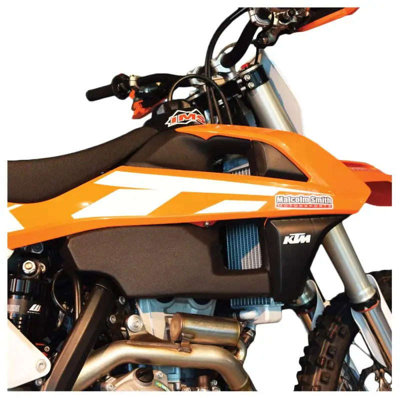 Orange and black KTM dirt bike with 113336-BK1 IMS fuel tank 4.5 gal