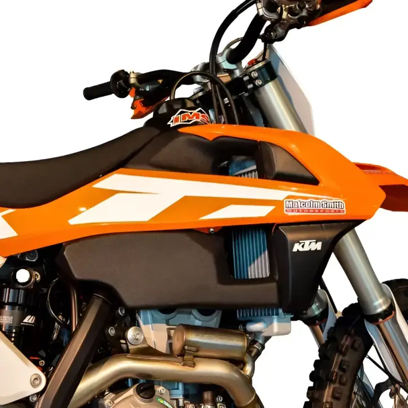 Orange and black KTM dirt bike with 113336-BK1 IMS fuel tank 4.5 Gal