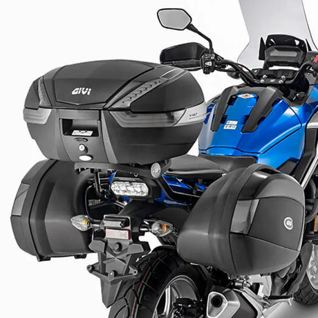 Givi 1146FZ Top Case Hardware mounted on a blue motorcycle, featuring V35 MONOKEY® SIDE cases in matte black with red lenses.