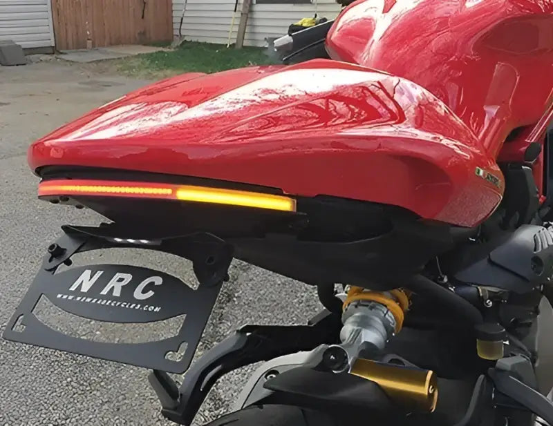 Red motorcycle with 1200-FE Fender Eliminator Duc and aftermarket tail light
