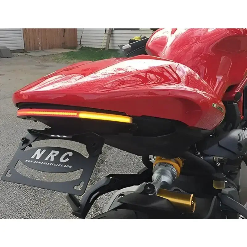 Red motorcycle with 1200-FE Fender Eliminator Duc and aftermarket tail light