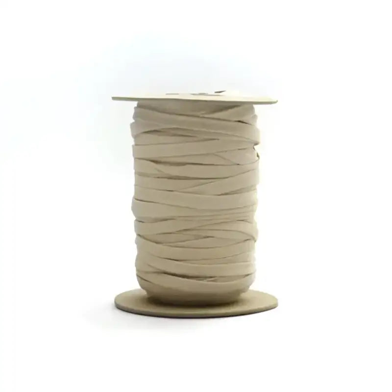 Spool of beige ribbon for 1211 Life Industry Bondbreaker 50 Yds 1/8 inch wide