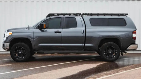 Gray pickup truck with roof rack featuring Sherpa Equip Bear Half Fairing for added style