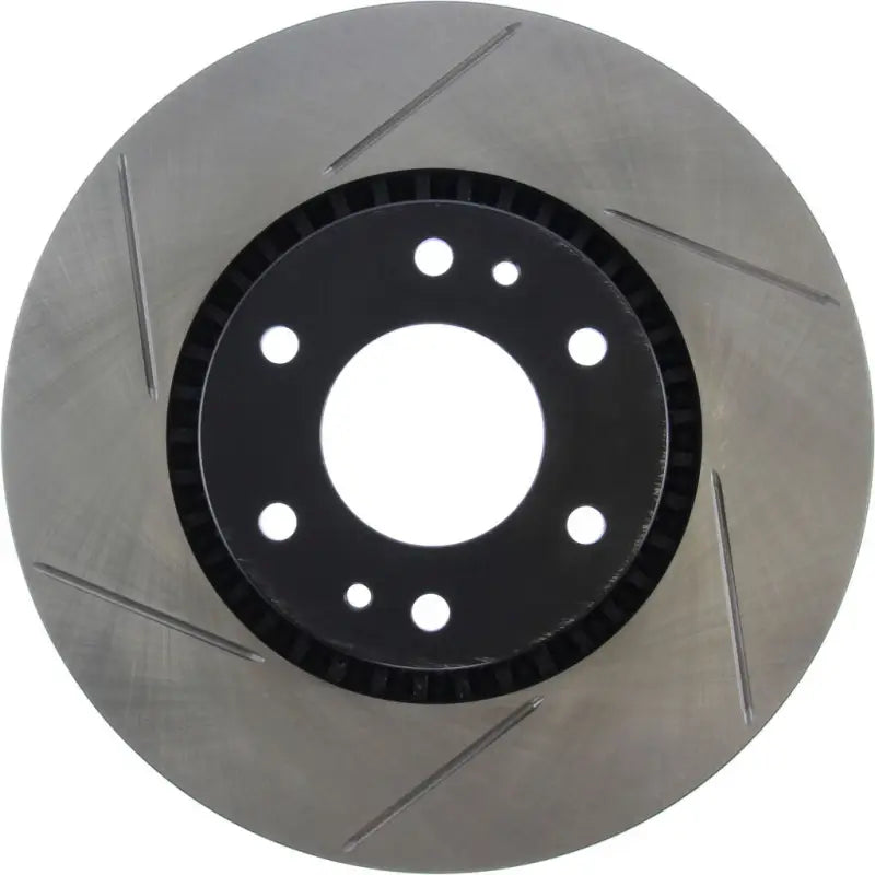 Silver Stop Tech slotted brake rotor with grooves and holes, right side
