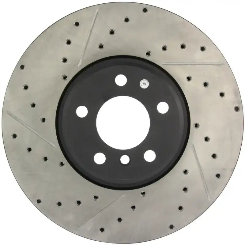 Stop Tech 34060R slotted brake rotor with drilled holes for cooling