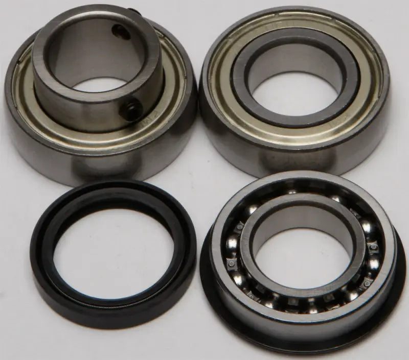Metal bearings and black rubber seal from 14-1057 Chain Case Bearing Seal Kit