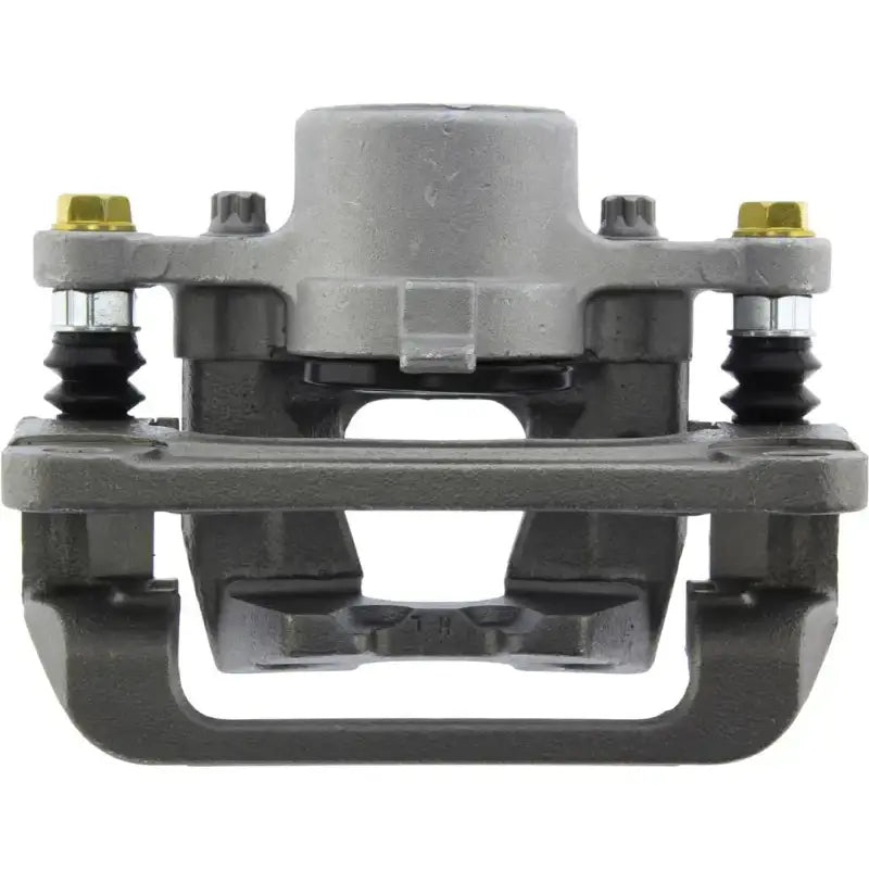 Gray brake caliper with gold bolts from Stop Tech semi-loaded brake caliper series