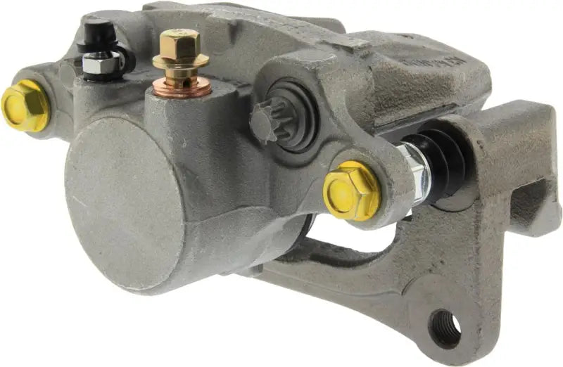Gray Stop Tech semi-loaded brake caliper with gold bolts for performance stopping