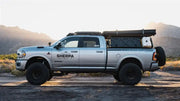 Silver Sherpa Equip Direct Fit truck with black accents, bare processed aluminum roof rack