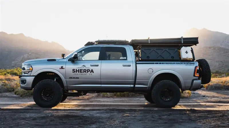 Silver Sherpa Equip Direct Fit truck with black accents, bare processed aluminum roof rack