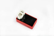 Red and black CDI box with white connectors, perfect for RV parts & accessories