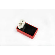 Red and black CDI box with white connectors, perfect for RV parts & accessories