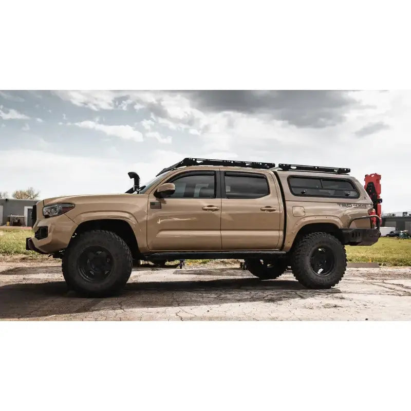 Lifted 2019 Toyota Tacoma 4x4 with Sherpa Equip Crow’s Nest truck topper rack