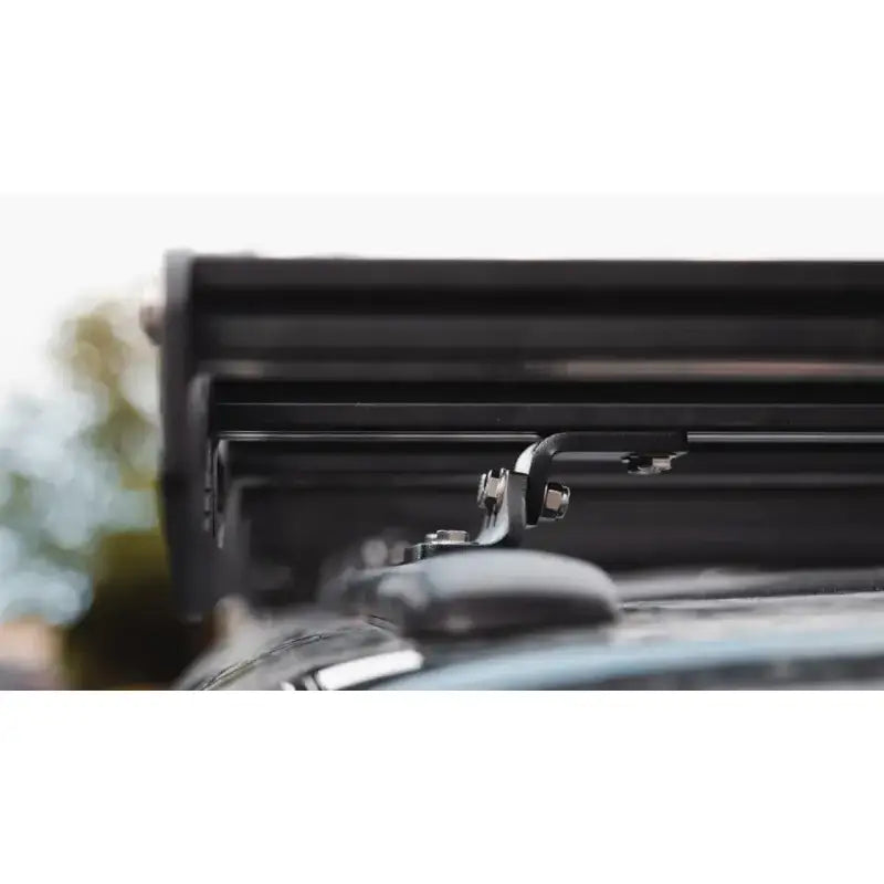 Black Sherpa Crow’s Nest truck topper rack with silver metal hooks